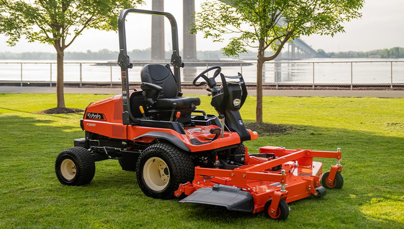 Kubota F2690 Mower sitting in a riverfront park on partly cloudy day.