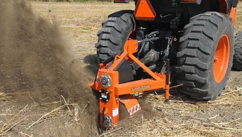 Land Pride Series Ditcher DT35 digging a trench in a field.