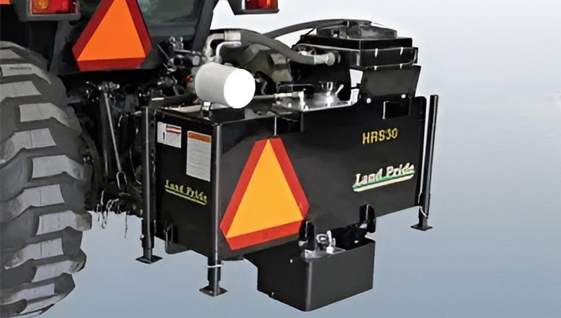 Land Pride Reservoir System Attachment isolated on a gradient background.